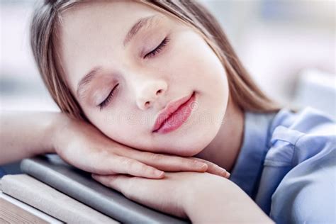 Beautiful Appealing Girl Dreaming On Many Books Stock Photo Image Of
