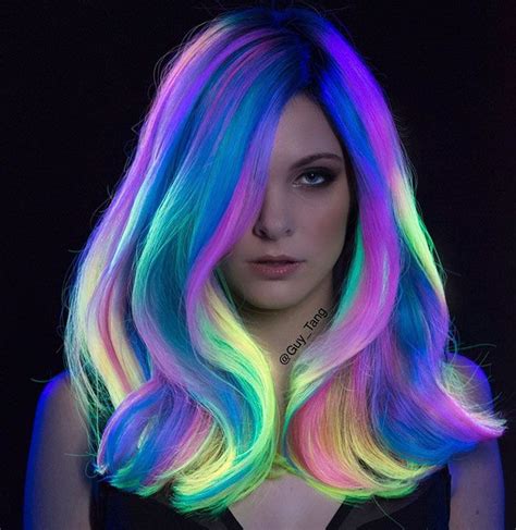 people are loving this new glow in the dark hair trend rainbow hair color neon hair