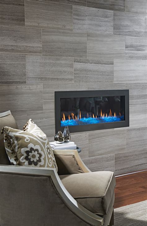 Maybe you would like to learn more about one of these? Love the floor-to-ceiling tile surround on this fireplace ...