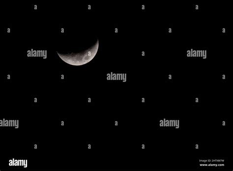 Crescent Moon In The Dark Night Sky High Resolution Photo Stock Photo