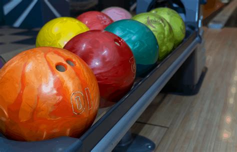 How Heavy or Light Can a Bowling Ball Be? - Indoor Game Bunker