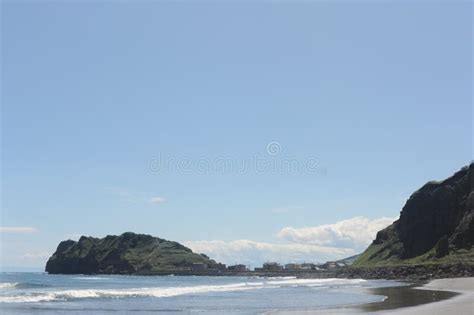 Picturesque Seashore With Rocks And Beach On A Sunny Day With Clear