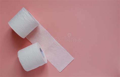 Lots Of Rolls Of White Toilet Paper On A Pink Background Panic Covid
