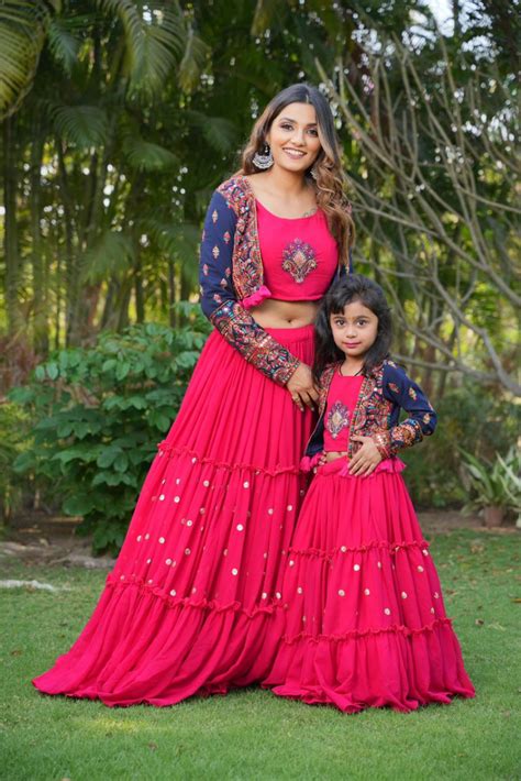 pink color twinning mother daughter lehenga choli with jacket
