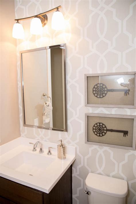 28 inspiring ways to use wallpaper in your bathroom. Neutral, graphic wallpaper takes this small bathroom from ...