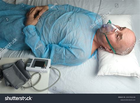 Elderly Man Patient Blue Shirt Lies Stock Photo 2047456148 Shutterstock