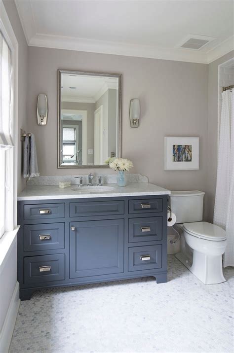 This navy blue vanity is midnight blue from fusion mineral. Navy Bathroom Decorating Ideas
