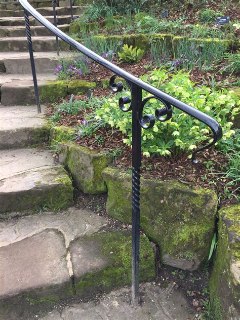 What are the shipping options for iron stair railings? Beautiful railings at RHS Wisley | Railings outdoor, Outdoor stair railing, Outdoor handrail