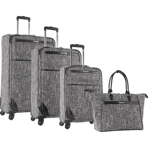 The Nine West Voyajour 4 Piece Expandable Spinner Luggage Set Has A