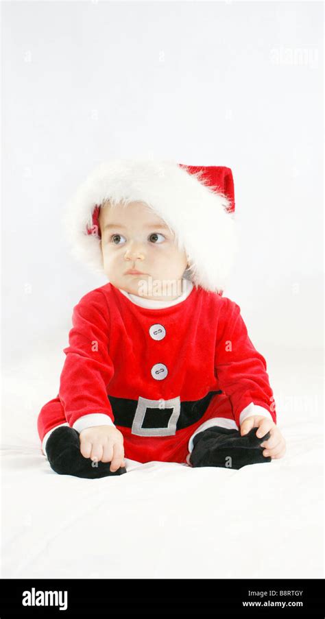 Baby Boy In Santas Outfit Stock Photo Alamy