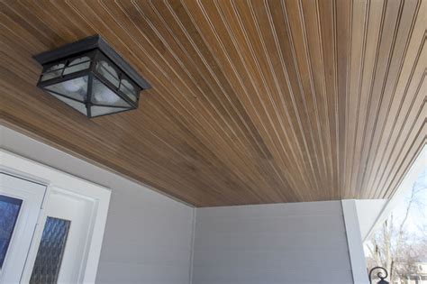 James Hardie Pearl Gray Siding Installation With Wooden Porch Ceiling