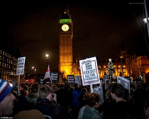 Protester Led From Parliament Square By Police After Syrian Airstrikes