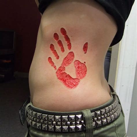 Sacrificial Tattoo Trend Sees People Cut Burn And Etch Skin Mirror