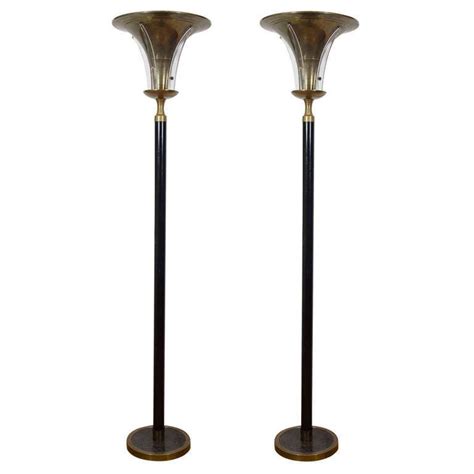 art deco style pair of black enamel over metal torchiere lamps from a unique collection of