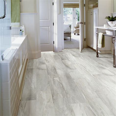 The actual plank thickness is measured in millimetres and includes the top polyurethane surface , the wear layer, the core and the backing. Shaw Floors Elemental Supreme 6" x 36" x 4mm Luxury Vinyl Plank in Blissful & Reviews | Wayfair