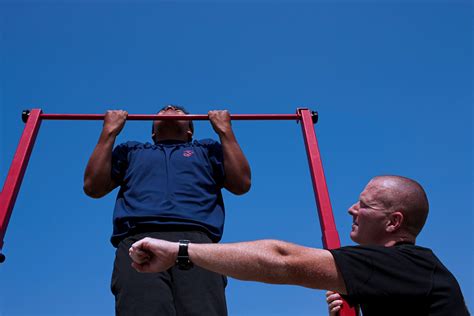 Aspring Marine Doing Pull Ups During Physical Fitness Test