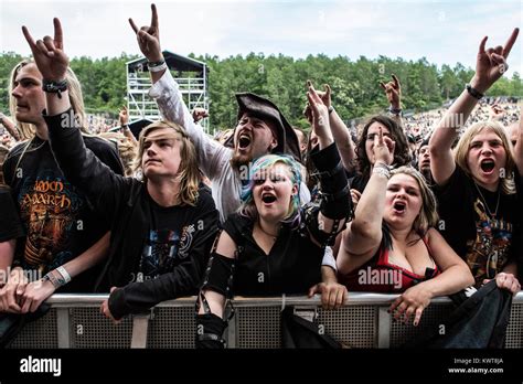 The Heavy Metal Fans Go Crazy In Front Of The Stage During The Concerts