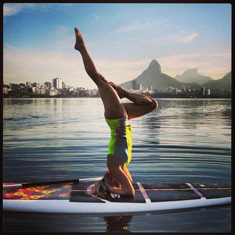 Sup Yoga Also Known As Puddleboard Yoga Paddle Board Yoga