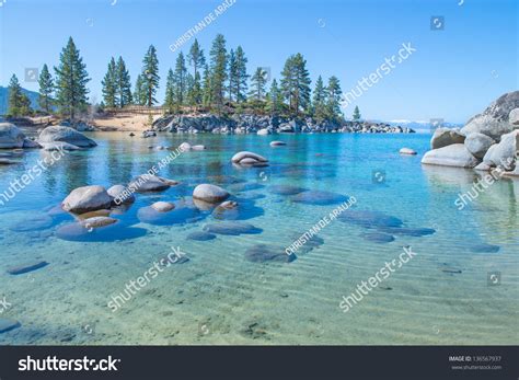 Beautiful Blue Clear Water On The Shore Of The Lake Tahoe Stock Photo