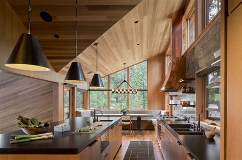 Undermount sinks are becoming all the rage in many modern kitchens for numerous reasons. Black Butte House by Woofter Architecture in 2020 | Black ...