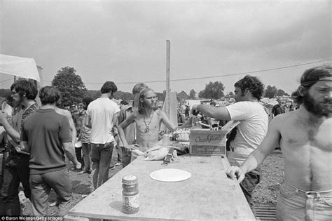 woodstock 1969 performers man serves currants at woodstock festival in bethel new york