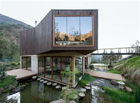 Casa El Maqui In Chile Is Surrounded By Flooded Gardens That Help Cool