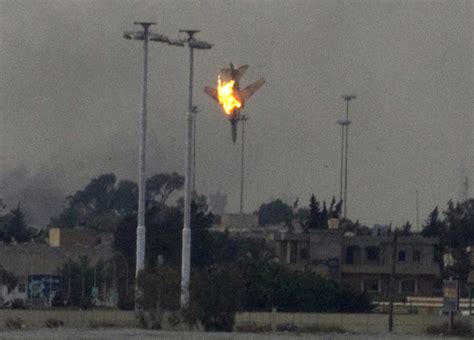 Crisis In Libya Us Bombs Qaddafis Airfields Cbs News