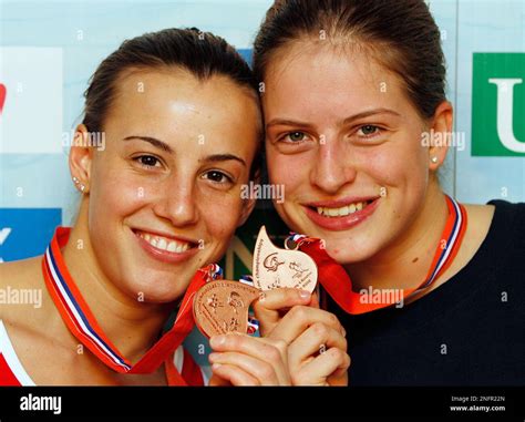 Italys Tania Cagnotto Left And Noemi Batki Pose For Photographers