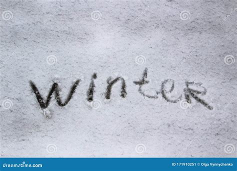 A Word Winter Written On The Snow Background Stock Image Image Of