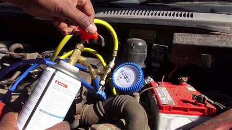 Unscrew this cap to reveal the port. Car Air Conditioner Freon Refill Cost | Sante Blog