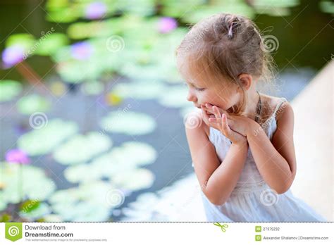 Little Girl Near Lily Pond Stock Photography Image 27375232