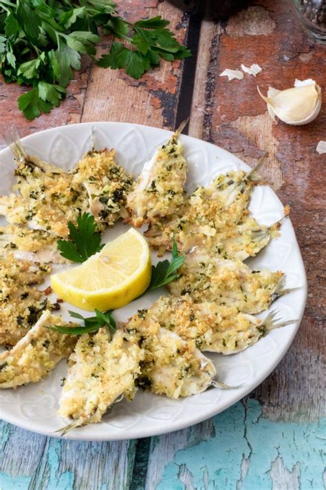 Ricetta Alici Gratinate Al Forno Dissapore Fish Recipes Whole Food