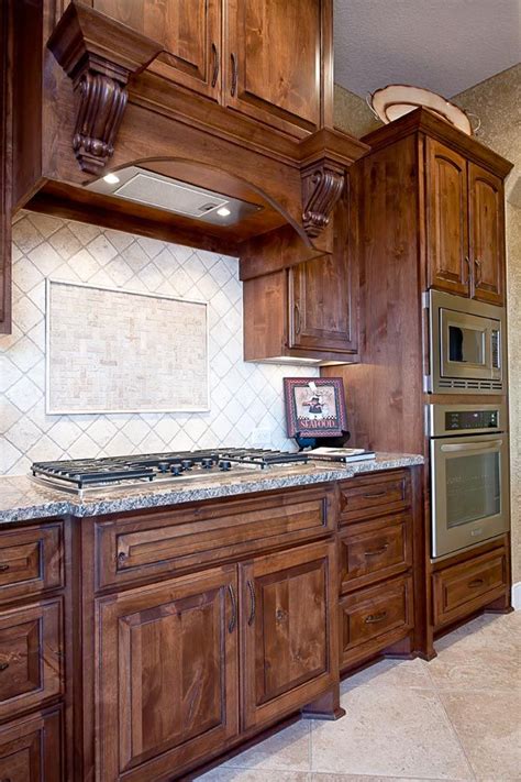 Not using knotty alder for our cabinets. knotty alder wood | Stained kitchen cabinets, Solid wood ...