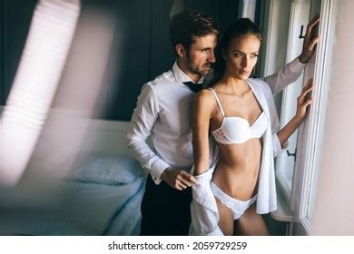 Sensual Foreplay By Sexy Couple Bedroom Stock Photo