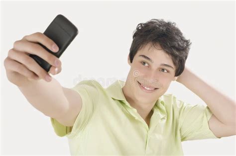 Happy Young Man Taking A Selfie Photo With His Smart Phone Stock Image