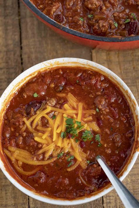 Homemade beef chili with beans. Classic Beef Chili is a ONE POT classic comfort food made with ground beef, kidney beans ...