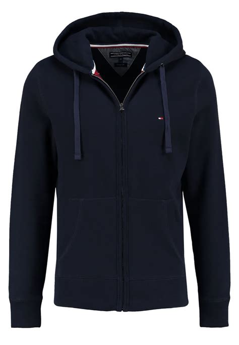 Célèbre pour son style américain classique et son esthétique emblématique « preppy avec une touche personnelle », le logo. Tommy Hilfiger SIMON Sweat zippé blue - Sweat zippé homme ...