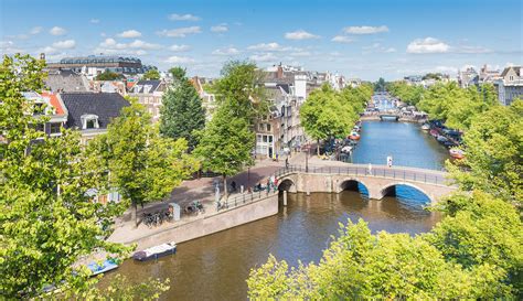 amsterdam s iconic canals are a must see for anyone visiting the city