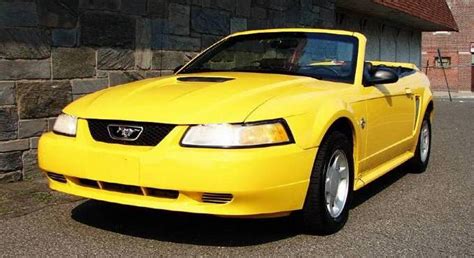 Chrome Yellow 1999 Ford Mustang Convertible Photo