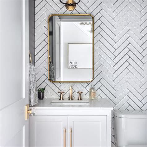 This White Subway Tile Laid In Herringbone Pattern Really Adds Texture