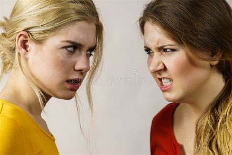 Angry Girls Looking At Each Other Stock Photo Image Of Emotion Argue