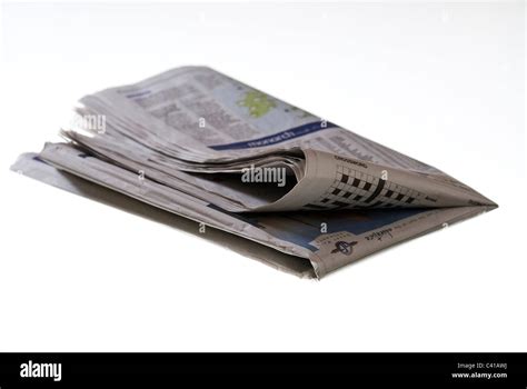 Folded Newspaper On White Background Stock Photo Alamy