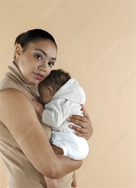 Mother Holding Her Baby Stock Image F0011788 Science Photo Library