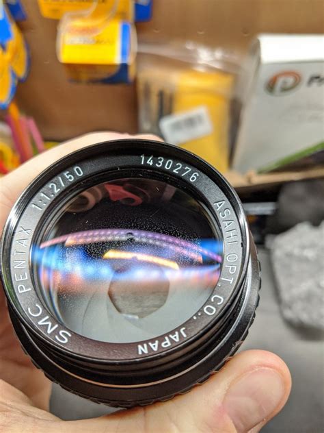 50mm 12 With Weird Dots Inside Lens What Is The Damage And Where To