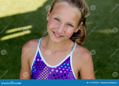 Young Girl In A Swimsuit On A Shelf By The Pool Stock Image Image Of Fashion Rays 111975255