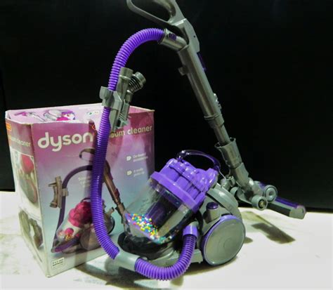 Vacuum cleaners nowadays are much more than what they use to be back in the day. Save On Toys!: Dyson DC08 Toy Vacuum Cleaner