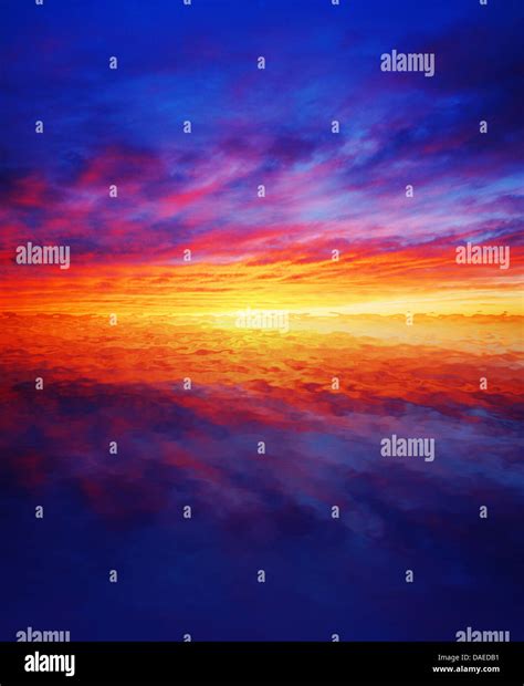 Beautiful Colorful Sunset Reflected Over Water Stock Photo Alamy
