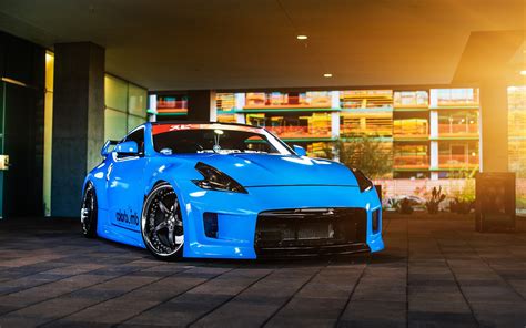 The wallpaper trend is going strong. Wallpaper : blue cars, sports car, Nissan 370Z ...