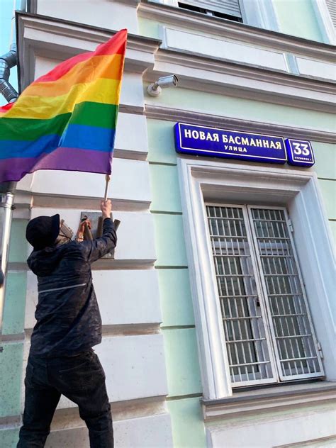 pussy riot flies lgbt flags from gov t buildings to mark putin s birthday the moscow times