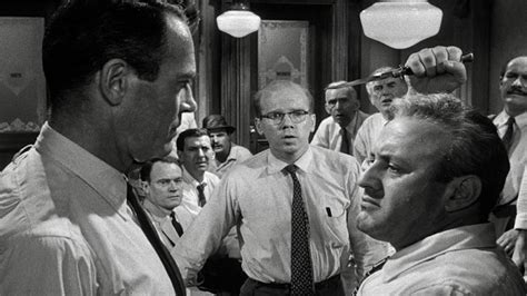 The defense and the prosecution have rested and the jury is filing into the jury room to decide if a young man is guilty or innocent of murdering his father. The Iconic Moment: 12 Angry Men (1957) | The Ace Black Blog